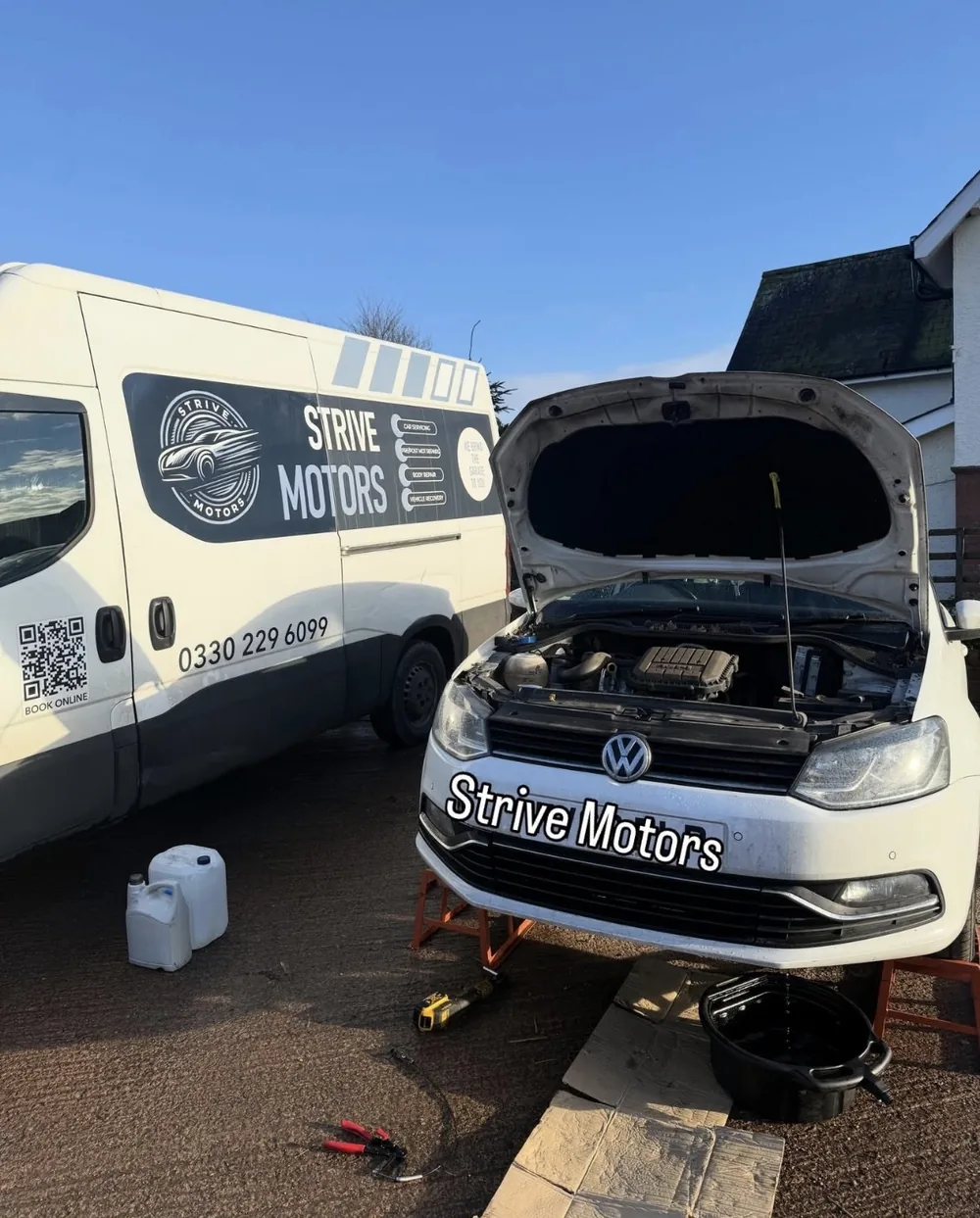 Strive Motors technician carrying out vehicle diagnostic work